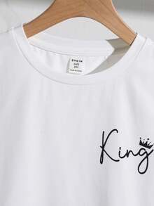 SHEIN Tween-Jungen Pyjama-Set mit Rundhalsausschnitt, kurzen Ärmeln und T-Shirt mit Buchstabenmuster und karierter Hose