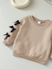 Sudadera de manga larga con lazo lindo y versátil en beige para bebé niña, otoño/invierno - Beis - Ver 6