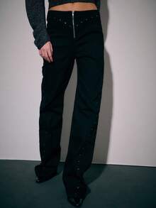 Nöista 高腰喇叭裤，前片和侧缝处饰有金属铆钉。采用简洁的腰带和外露拉链设计，结构感十足，外观大胆流畅，带有复古气息。 - 黑色 - 查看 7