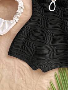 Soleia 女士休闲度假新款 V 领露背系带蝴蝶结镂空黑白撞色修身罗纹连体裤，适合派对、约会、下午茶、海滩