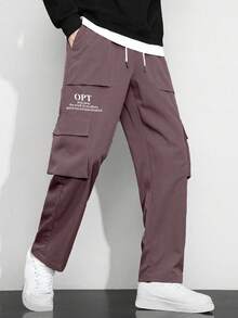 Manfinity Hypemode 宽松男士标语图案翻盖口袋侧抽绳腰工装裤，适合秋季 - 巧克力棕 - 查看 3