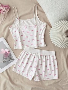 少女春夏情人节家居服，清新少女风/美式风格，蕾丝蝴蝶结白色吊带背心和超短裤纽扣套装，女童睡衣套装，女童夏季睡衣套装，少女睡衣套装，可爱睡衣套装，蝴蝶结睡衣套装，女童夏季睡衣睡衣套装，吊带蝴蝶结两件套，女童夏季套装，可爱睡衣套装，蝴蝶结印花两件套 - 粉色 - 查看 2