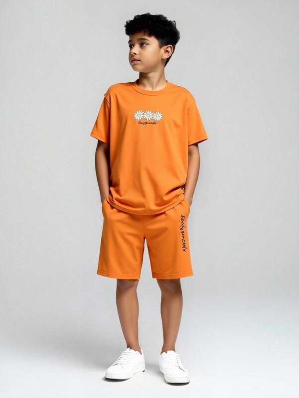 SHEIN Explorewe 2 Pieces Tween Boy Floral & Letter Print Short Sleeve T-Shirt And Shorts Casual Outfit Set