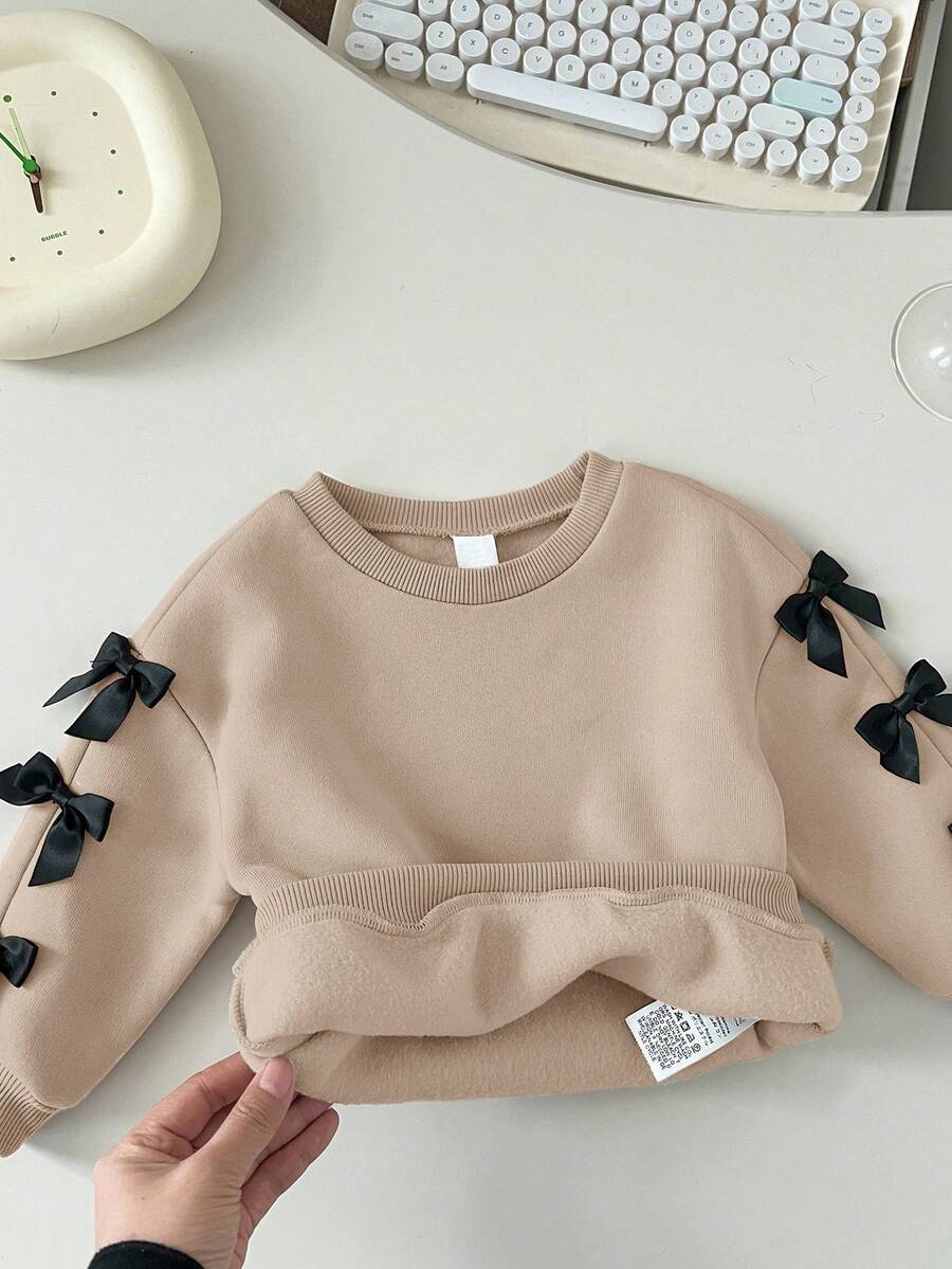Sudadera de manga larga con lazo lindo y versátil en beige para bebé niña, otoño/invierno - Beis - Ver 1