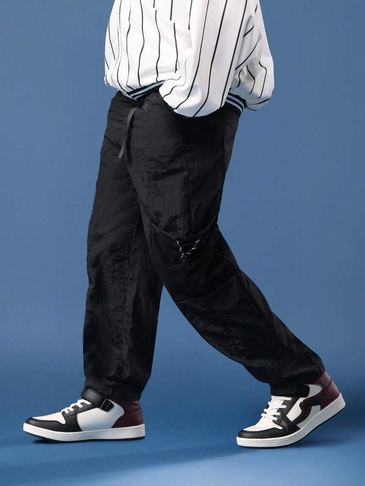Nylon Cargo Pants With Mesh Panels And Elastic Ankles