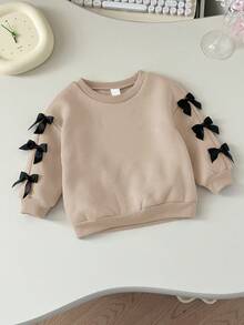 Sudadera de manga larga con lazo lindo y versátil en beige para bebé niña, otoño/invierno - Beis - Ver 8