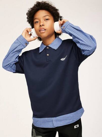 SHEIN Explorewe 青少年男孩单件长袖格子拼布衬衫，海军蓝主色调沉稳稳重，蓝紫色格子拼布更添时尚气息。复古优雅的衣领设计，UNPL印花提升整体质感。这款衬衫融合了格纹元素与现代设计，展现独特的时尚魅力和个性化元素。