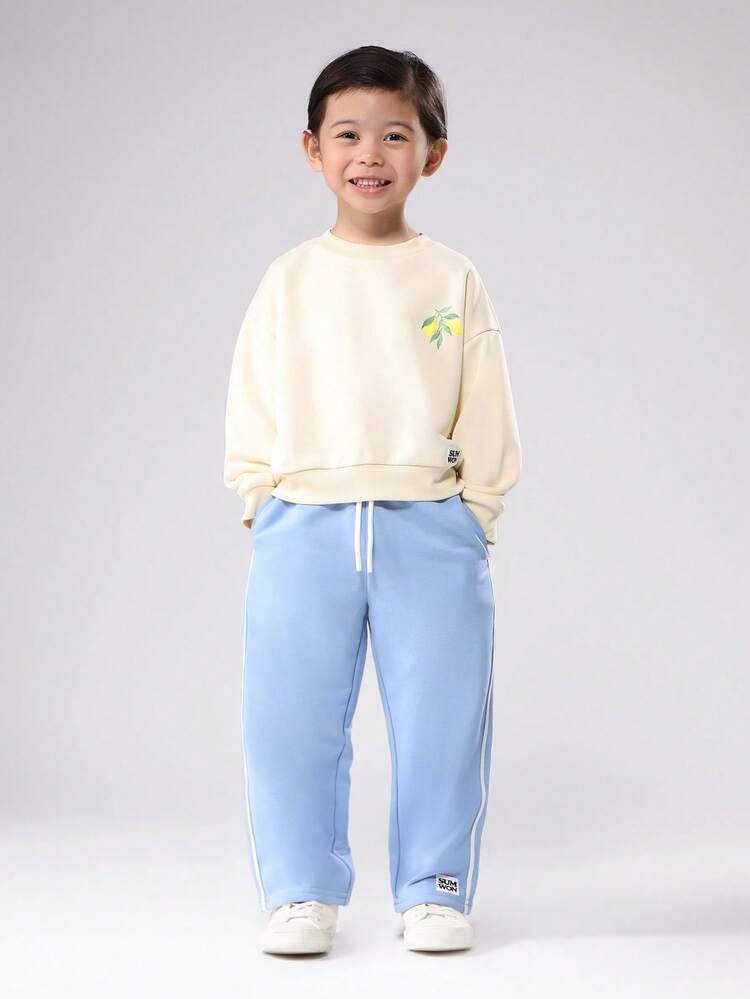 Felpa con stampa di limoni e pantaloni a gamba larga