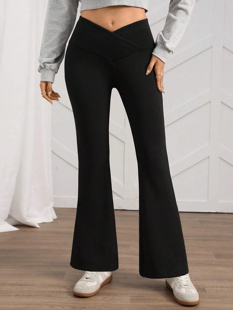 SHEIN LUNE Leggings ajustados con vuelo y forro térmico para mujer, cintura en V, color negro de moda - Negro - Ver 1
