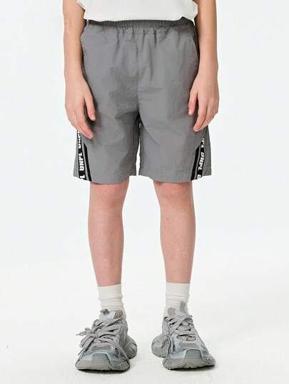 SHEIN Explorewe Tween Boys Casual Letter Graphic Ribbon Decor Shorts