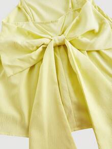 SHEIN MOD Solid Big Bow Back Ruffle Hem Cami Top
