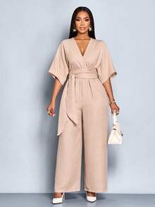 SOLERSUN Early Fall Women's Wear Elegant Commuter Daily Leisure Apricot Color Yarn-Dyed Woven Fabric Cross-Wrap V-Neck Back Slit Button Removable Belt Tie Knot Batwing Sleeves Three-Quarter Sleeves Gathered At Waist Jumpsuit Trousers - Khaki - View 1