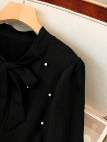 GlowEve CURVE 大码女式长袖连衣裙，配珍珠装饰和领结装饰 - 黑色 - 查看 6