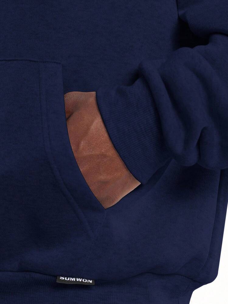 Felpa con cappuccio squadrata con tasca centrale