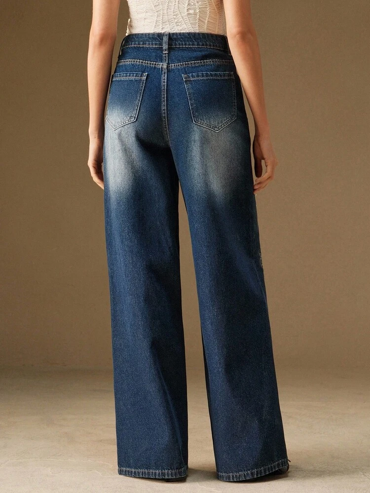 Pantalones de mujer de mezclilla azul casual y con bordados huecos de moda