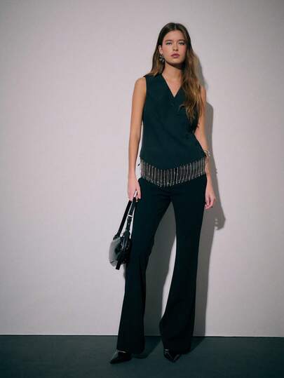 Nöista Chaleco asimétrico sin mangas con botones y detalles de flecos y cuentas en el bajo; un chaleco asimétrico llamativo adecuado para atuendos de noche, looks por capas y estilos formales de moda; ideal para otoño, invierno, Halloween y eventos de Año Nuevo.