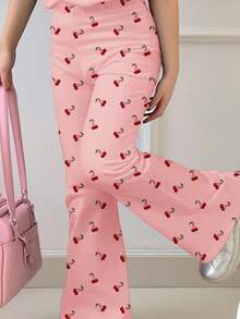 SHEIN Bộ đồ đôi màu hồng kem, họa tiết quả anh đào nhỏ xinh, kiểu dáng cổ điển dành cho bé gái tuổi teen, gồm áo thun cổ tròn tay ngắn dáng rộng và quần ống loe ôm sát, phù hợp cho mọi mùa. - Nhiều màu - Xem 4