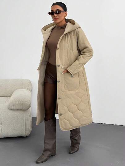 EURMUSE Beige Quilted Hooded Parka: Relaxed Comfort Fit With Adjustable Waist, Great For Weekend Walks Or Urban Travel, Made From Soft Quilted Fabric In Beige With A Hood, Front Snap Buttons And Spacious Patch Pockets Long Coat Women Coats Long Jacket Women Winter Coat Hooded Coat Long Jacket For Women Outerwear Women