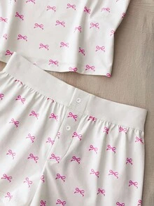 少女春夏情人节家居服，清新少女风/美式风格，蕾丝蝴蝶结白色吊带背心和超短裤纽扣套装，女童睡衣套装，女童夏季睡衣套装，少女睡衣套装，可爱睡衣套装，蝴蝶结睡衣套装，女童夏季睡衣睡衣套装，吊带蝴蝶结两件套，女童夏季套装，可爱睡衣套装，蝴蝶结印花两件套 - 粉色 - 查看 6