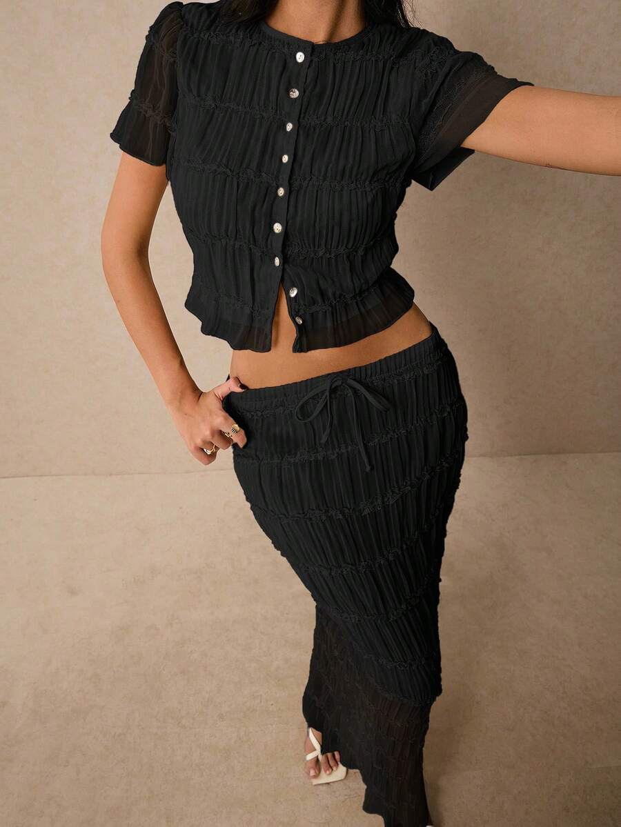 Poéselle Bộ 2 món áo cánh xếp ly bằng vải voan và chân váy dài cho nữ - màu đen - Xem 1