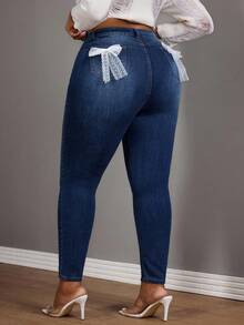 Slaydiva Plus High Waist Bow Back Skinny Jeans - Medium Wash - View 1