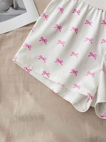 少女春夏情人节家居服，清新少女风/美式风格，蕾丝蝴蝶结白色吊带背心和超短裤纽扣套装，女童睡衣套装，女童夏季睡衣套装，少女睡衣套装，可爱睡衣套装，蝴蝶结睡衣套装，女童夏季睡衣睡衣套装，吊带蝴蝶结两件套，女童夏季套装，可爱睡衣套装，蝴蝶结印花两件套 - 粉色 - 查看 7