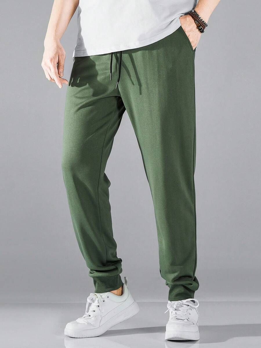 Manfinity Homme Men's Casual Solid Color Pocket Drawstring Sweatpants