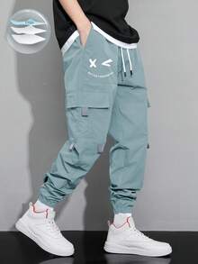 Claim Dot Loose Fit Men's Cartoon Printed Flap Pocket Cargo Pants - Baby Blue - View 1