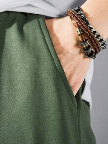 Manfinity Homme Men's Casual Solid Color Pocket Drawstring Sweatpants