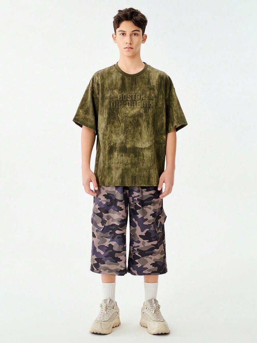 SHEIN Bộ 2 áo thun cổ tròn tay ngắn cho bé trai tuổi teen + quần short cargo in họa tiết rằn ri dáng rộng, trang phục dạo phố thường ngày thích hợp cho hoạt động ngoài trời, du lịch, lễ hội âm nhạc, tụ tập - Nhiều màu - Xem 1