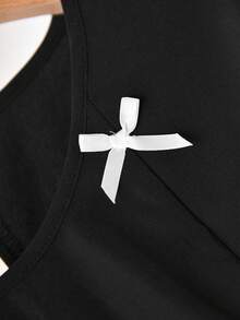 CosyJoli 大码女式圆领撞色蝴蝶结设计荷叶边下摆长袖衬衫，休闲办公装，黑色