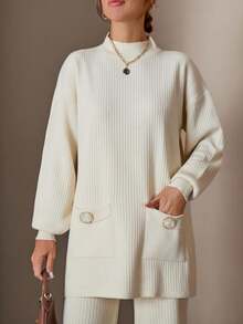 Completo donna con top a collo alto a maniche lunghe e pantaloni, tinta unita