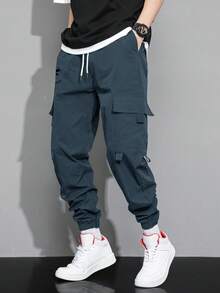 Claim Dot 秋季宽松男士卡通印花翻盖口袋裤