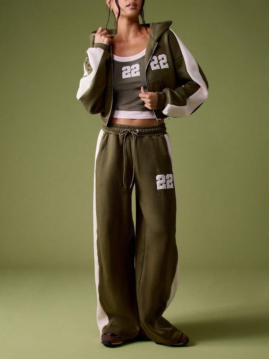 MISSGUIDED Weite Jogginghose mit Nummer-Muster und Farbblock-Design für lässigen Komfort - Armeegrün - Übersicht 1