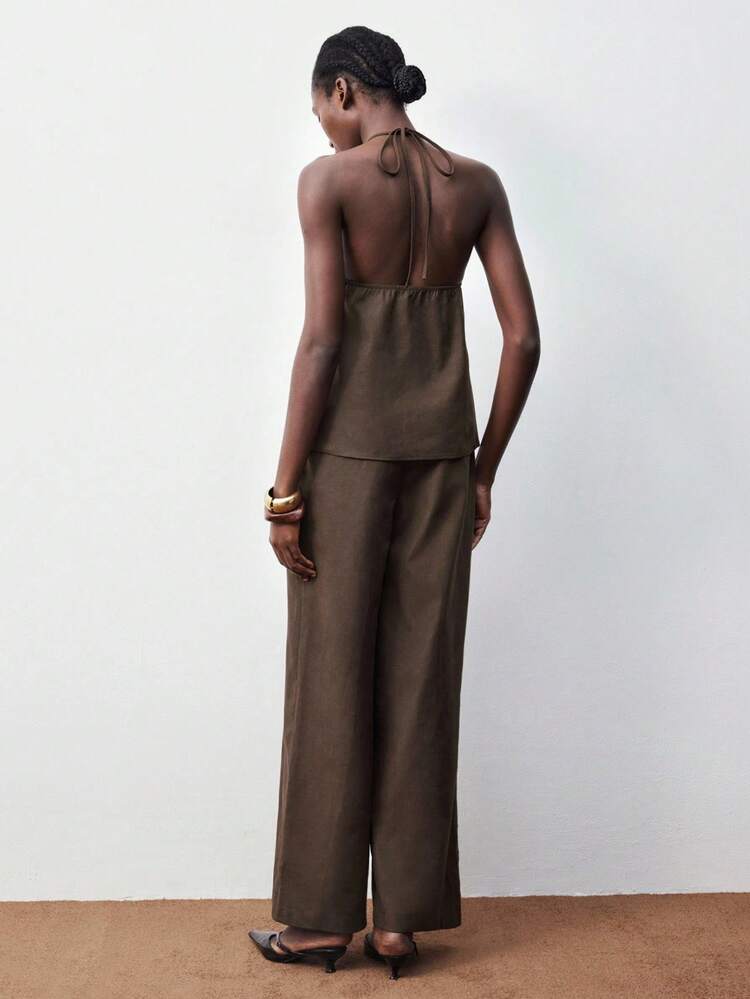 SHEIN Maija Black Padded Shoulder Boat Neck Cropped Metal Buckle Strap Decor Backless Crop Top & High Waisted Wide Leg Pants Urban Chic Minimalist Matching Set For Women Saudi National Day Brown Party Outfit Old Money Beach Outfit For Women Thanksgiving Outfit For Women Halloween Costume Women