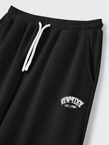 JNSQ 青少年女孩超大弹性腰带运动衫和裤子套装，趣味字母印花长款运动裤，适合秋冬日常穿着、户外活动、度假、街头服饰、派对和休闲 - 黑色 - 查看 5