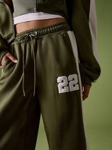 MISSGUIDED Weite Jogginghose mit Nummer-Muster und Farbblock-Design für lässigen Komfort - Armeegrün - Übersicht 6