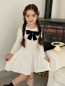 LMoss Kids 年轻女孩纯色圆领修身蝴蝶装饰针织连衣裙