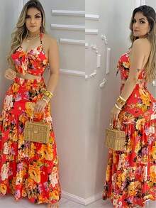 Bộ đồ hai mảnh gồm áo hai dây và chân váy in hoa, kiểu dáng nghỉ mát, thích hợp cho nữ. - Nhiều màu - Xem 1