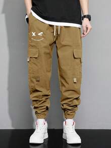 Claim Dot 男士表情印花翻盖口袋抽绳腰工装裤，适合秋季 - 駝色 - 查看 7