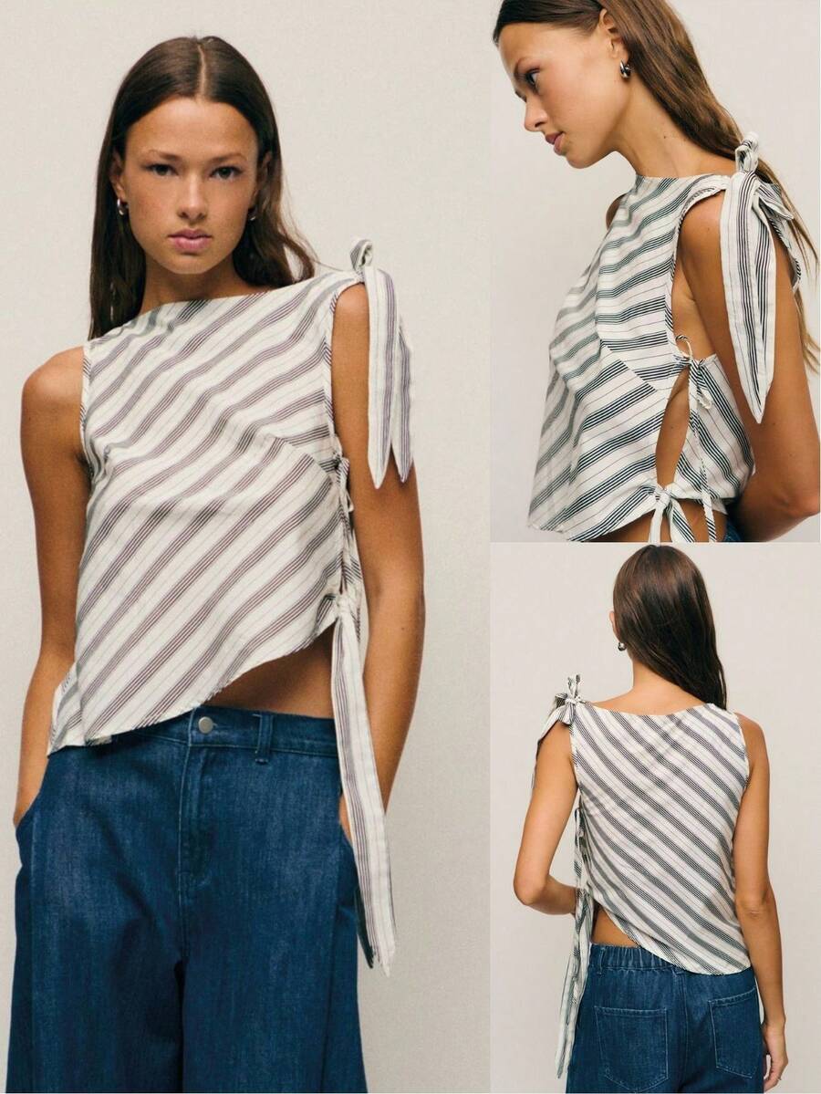 Nöista Esta blusa sin mangas presenta rayas diagonales en blanco y negro, un bajo asimétrico y cierres laterales con lazos, combinando el encanto vintage con el estilo callejero Y2K, perfecta para otoño, invierno y el estilo de las mujeres de "old money". - Blanco y Negro - Ver 1