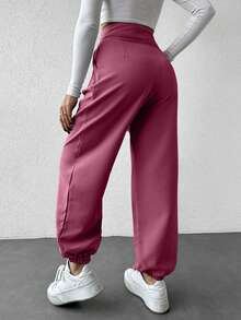 Pantaloni de costum gri pentru femei în formă de con cu talie detaliată