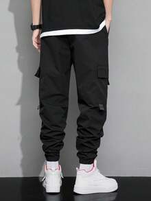 Claim Dot 宽松男士表情印花翻盖口袋抽绳腰工装裤，秋季 - 黑色 - 查看 2