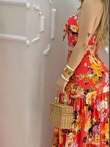 Bộ đồ hai mảnh gồm áo hai dây và chân váy in hoa, kiểu dáng nghỉ mát, thích hợp cho nữ. - Nhiều màu - Xem 2
