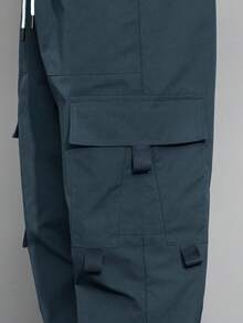 Claim Dot 秋季宽松男士卡通印花翻盖口袋裤