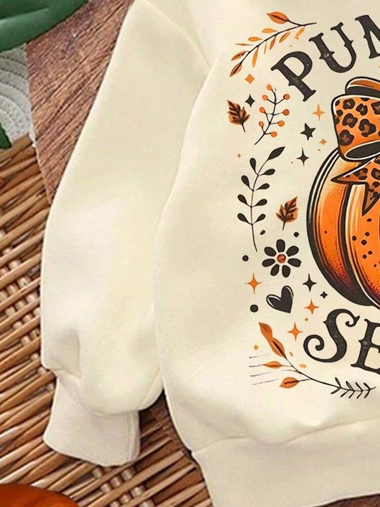 SHEIN Áo nỉ dệt kim dài tay thoải mái cổ tròn in hình quả bí ngô dễ thương dành cho lễ Halloween, họa tiết da báo và nơ, phù hợp cho trang phục Halloween mùa thu/đông, dành cho bé gái - Nhiều màu - Xem 4