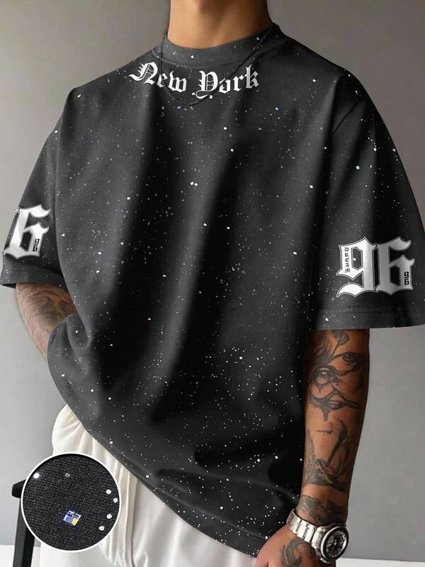 Manfinity EMRG Black Galaxy Splatter "New York 96" Gothic Font Tee | Starry Night Fleck Craft | Vintage Baseball Number Print | Ultra Loose Hip-Hop Fit | Silver Stamped Premium Fabric | Street American Style | Unisex Couple Wear,Men's Letter Print Short Sleeve Loose Fit Metallic T-Shirt