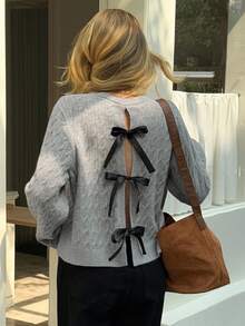 Livesso Women's Loose Fit Round Neck Bowknot Hollow Back Sweater