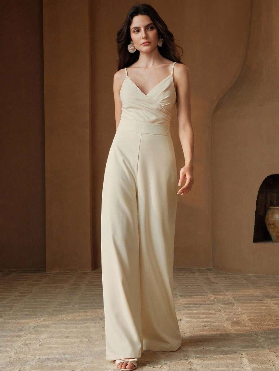 Anewsta 女士优雅浪漫现代细肩带腰部收紧 V 领褶皱胸部设计露背透明蕾丝连体裤直筒裤，新年服装 - 杏色 - 查看 1