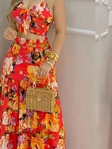 Bộ đồ hai mảnh gồm áo hai dây và chân váy in hoa, kiểu dáng nghỉ mát, thích hợp cho nữ. - Nhiều màu - Xem 5
